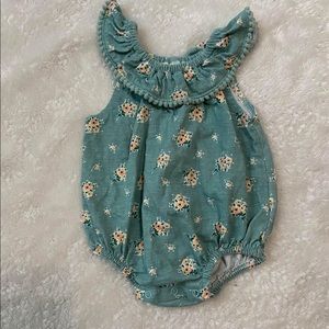 Green romper with yellow flowers for baby girl